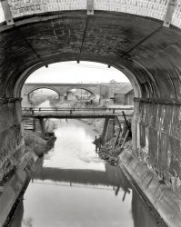 Savannah, Georgia, circa 1939. "Georgia Central Railway Bridge, Railroad Street." 8x10 inch acetate negative by Frances Benjamin Johnston. View full size.