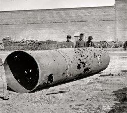 Richmond, April 1865. "Battered smokestack from C.S.S. ironclad ram Virginia No. 2. Holes made by Federal batteries." Wet plate glass negative. View full size.
