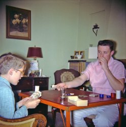 That's what I like to imagine my future-brother-in-law was telling me as the showdown is about to come in our poker hand here in the living room of our home in Larkspur, California. The "shut up" part was, of course, something I was familiar with hearing often enough from others in non-wagering situations. At my side I had a glass with a finger of root beer, playing the part of whiskey, to emulate (pay homage to?) the saloon scenes in the old cowboy movies I'd watch on TV Saturday mornings. He became my brother-in-law in actuality two years later, and passed away just two months ago. Rest in peace, old friend. My sister took this 2¼" square Kodacolor negative.  View full size.