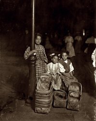 Cincinnati, August 1908. "Marie Costa, basket seller, lives at 605 Elm Street. Sixth Street Market, 9 p.m. Had been there since 10 a.m. Sister and friend help her." View full size. Photograph and caption by Lewis Wickes Hine.