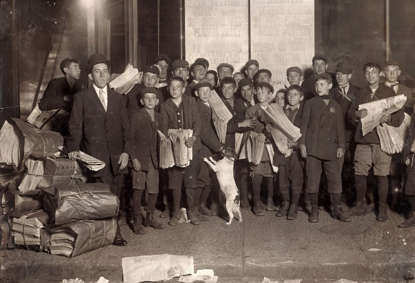 Newsies and Dog: 1909 Sunday 5 a.m. Newsies starting out. Boston, Massachusetts. October 1909. View full size. Photograph by Lewis Wickes Hine.