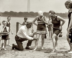 &nbsp; &nbsp; &nbsp; &nbsp; Commemorating the Potomac Thighway Patrol's 100th anniversary, and one of Shorpy's most popular posts --
June 30, 1922. "Washington policeman Bill Norton measuring the distance between knee and suit at the Tidal Basin bathing beach after Col. Sherrill, Superintendent of Public Buildings and Grounds, issued an order that suits not be over six inches above the knee." 4x5 inch glass negative, National Photo Company Collection. View full size.