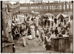 On the beach at New York's Coney Island circa 1910-1915. View full size. 5x7 glass negative, George Grantham Bain Collection.