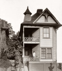 Man on the porch of his house in Georgia, probably near Atlanta. 1899 or 1900. View full size. Gelatin silver print from the collection of W.E.B. Du Bois.