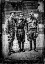 Fort Dix, 1917. That's my 5'2" grandfather prior to being shipped over to France as part of the Allied Expedition Force. 

While there, he won a boxing medal and was subsequently caught in a mustard gas attack. He lived for another 52 years with seared lungs and had to expectorate into the ever-present paper sack that he carried with him.