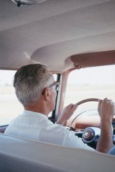 My father at the wheel of our 1956 Rambler station wagon, somewhere in California in 1963. A patch of blue down the right edge says that my mother's in the front seat; I was in the back seat with my camera loaded with Ektachrome-X. I'm pretty sure by this point the dome light had lost its cover. View full size.