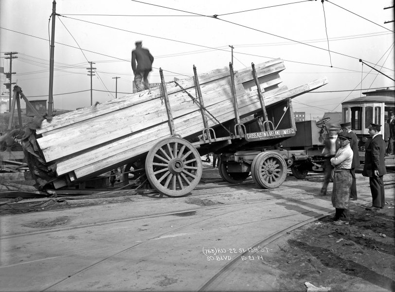 Mill Spill: 1914 October 21, 1914. Bronx, New York. A Cross, Austin, & Ireland Lumber Co. truck accident on the trolley tracks at East 138th Street and Southern (now Bruckner) Boulevard. 8x10 inch glass negative. View full size.