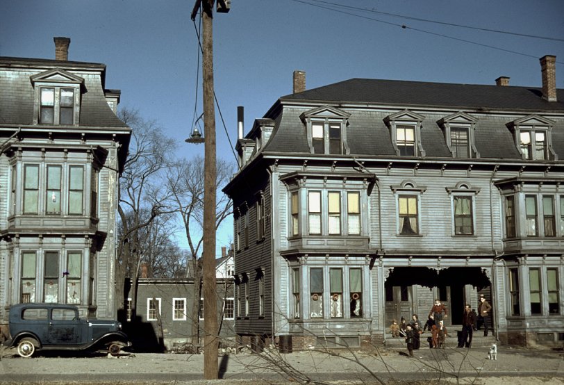 Paging Edward Hopper: 1940 Children in the tenement district, Brockton, Massachusetts. December 1940. Photograph by Jack Delano. View full size. These duplexes must have been fairly grand when they were new, probably around the turn of the century. They look like the house where Granny and Tweety Bird lived. Are they still there?