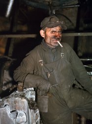 December 1942. Melrose Park, Illinois. "Chicago & North Western RR. William London has been a railroad worker 25 years -- now working at the roundhouse at the Proviso yards." 4x5 Kodachrome transparency by Jack Delano for the Office of War Information. View full size.