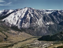 August 1942. Stillwater County, Montana. "Development at the site of the mill for the Mouat Chromite mine. Mouat was recently constructed at the foot of one of the higher peaks in Stillwater County." 4x5 Kodachrome transparency by Alfred Palmer for the Office of War Information. Library of Congress. View full size.