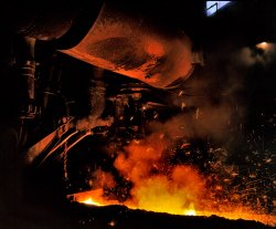 November 1941. Youngstown, Ohio. "Slag runoff from open-hearth furnace. Republic Steel Corporation." View full size. 4x5 Kodachrome transparency by Alfred Palmer for the Office of War Information.