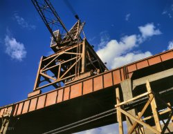 June 1942. "Construction at Douglas Dam, Tennessee Valley Authority." 4x5 Kodachrome transparency by Alfred Palmer for the OWI. View full size.