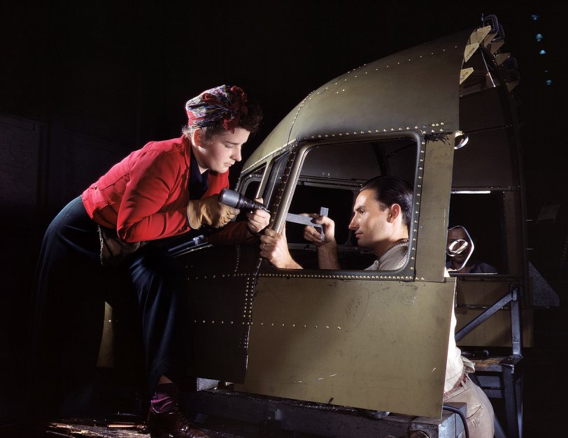 We Met at Work: 1942 October 1942. "Riveting team working on the cockpit shell of a C-47 transport at Douglas Aircraft Company, Long Beach, Calif. The versatile C-47 performs many important tasks for the Army. It ferries men and cargo across the oceans and mountains, tows gliders and brings paratroopers and their equipment to scenes of action." View full size. 4x5 Kodachrome transparency by Alfred Palmer for the Office of War Information. Happy Valentine's Day from Shorpy!