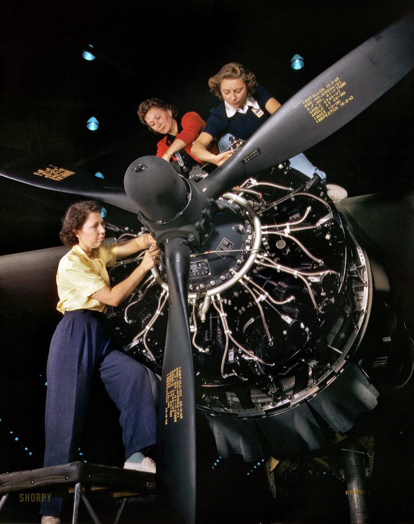 War Machine: 1942 October 1942. "The careful hands of women are trained in precise aircraft engine installation duties at Douglas Aircraft Company, Long Beach, Calif." Kodachrome by Alfred Palmer, Office of War Information. View full size.