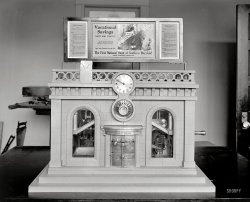Washington, D.C., circa 1918. "Bankers Automatic Receiving Teller Co." These machines (designed to look like little bank buildings) were used, among other places, in the D.C. schools into the 1930s to encourage thrifty habits. National Photo Company Collection glass negative. View full size.