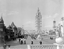 Visitors stroll on the boardwalk at Dreamland, Coney Island, N.Y., c. 1904. View full size.