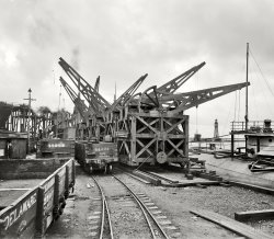 Buffalo, New York, circa 1901. "Unloading ore from whaleback carrier." 8x10 inch dry plate glass negative, Detroit Publishing Company. View full size.