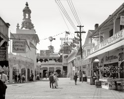 New York, August 1903. "South end of Bowery, Coney Island." Be sure to bring the kiddies -- "All the children will be presented with toys to-day." 8x10 inch dry plate glass negative, Detroit Publishing Company. View full size.