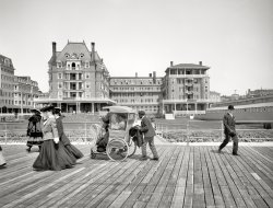 Atlantic City, New Jersey, circa 1905. "The Dennis." Where you can get pushed around on the Boardwalk. 8x10 inch glass negative. View full size.