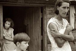 October 1935. "Boone County, Arkansas. The family of a Resettlement Administration client in the doorway of their home." View full size. 35mm nitrate negative by Ben Shahn for the Resettlement Administration.