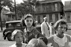 October 1935. "Girls outside movie house in Amite City, Louisiana." 35mm nitrate negative by Ben Shahn for the Farm Security Administration. View full size.