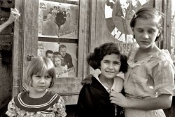 October 1935. At the movies in Amite City, Louisiana. View full size. 35mm nitrate negative by Ben Shahn for the Farm Security Administration.