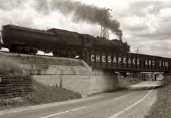 Summer of 1938. "Underpass in central Ohio, Route 40. Roadside does not at first present a definite or meaningful picture. Closer investigation begins to reveal the character of the place." View full size. 35mm nitrate negative by Ben Shahn.