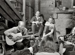 March 1940. "Skiers from Boston relaxing in lodge at North Conway, New Hampshire." Medium format negative by Marion Post Wolcott. View full size.
