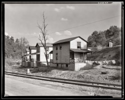 Company houses at Scotts Run mining camp near Morgantown, West Virginia. July 1935.  View full size. Photograph by Walker Evans.