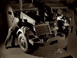 December 1941. "The ordnance department must satisfy itself that every halftrac scout car turned over to it by a Midwest manufacturer is fit for Army duty. The department's own inspector gives it a thorough going over from bumper to bumper. White Motor Company, Cleveland, Ohio." View full size. 4x5 nitrate negative by Alfred Palmer for the Office of War Information.