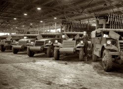 December 1941. "New recruits for America's armies. Scout cars ready for delivery. White Motor Company, Cleveland, Ohio." View full size. 4x5 nitrate negative by Alfred Palmer for the Office of War Information.