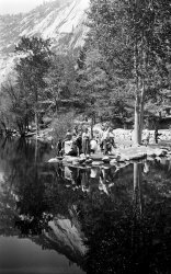 One can see Bill Bliss and the girl from this photo on the other side. As guessed by tterrace, this is probably Mirror Lake in Yosemite. View full size