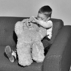 My brother feeding his bear.  I guess this bear likes his meals through his nose for some odd reason. 