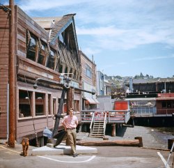 No, Tommie's not the guy with the anchor up ... well, with the anchor. That's me. Tiburon is a Marin County town on San Francisco Bay, and Tiburon Tommie's was a Chinese restaurant with a decor and cocktail selection that today would be called Tiki. Opened about 1955 by Tommie Cox and former Trader Vic's employee Johnnie Won, it closed around 1997 and today exists only in the warm nostalgic memories of older Marinites. This is the bay side of the building, which itself no longer exists. Existing was something that I didn't know this slide did until a couple days ago, when my friend who took it in 1969 and I were rooting around the spare room of his house and found a bunch of slides he'd forgotten about. This one's a 126 Ektachrome taken with a Kodak Instamatic. I recognized those aluminum sticks in the lower right corner as  legs of my tripod, so I must have been taking Super-8 movies that day. View full size.