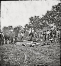 May 19 or 20, 1864. "Fredericksburg, Virginia. Burial of Federal dead. Photograph from the main Eastern theater of war, Grant's Wilderness Campaign, May-June 1864." Wet plate glass negative, Civil War Photographs Collection, Library of Congress. View full size.