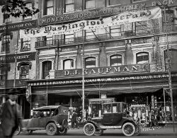 November 1920. Washington, D.C. "Washington Herald election screen." The screen being white sheets hung from this frame on election night, with wire-service voting results projected onto them from a stereopticon -- a practice dating back at least to the 1890s in cities across the United States, and which gradually died out with the advent of broadcast radio. Mold-flecked 4x5 inch glass negative from the National Photo Company Collection. View full size.
