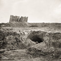 1865. "Earthwork fortifications and bomb-proofs in front of Petersburg, Va." Wet plate glass negative, Civil War collection, Library of Congress. View full size.