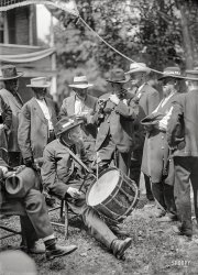 July 1913. Gettysburg, Pennsylvania. "Gettysburg reunion: G.A.R. & U.C.V. veterans at the encampment." Some of the 53,000 Civil War veterans, members of either the Grand Army of the Republic (Union troops) or the United Confederate Veterans, who reunited at Gettysburg on the 50th anniversary of the battle there. Harris & Ewing Collection glass negative. View full size.