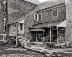 Spotsylvania County, Virginia, circa 1937. "St. Julien Plantation porch. Main house built 1794 with addition ca. 1812." 8x10 acetate negative by Frances Benjamin Johnston, Carnegie Survey of the Architecture of the South. View full size.