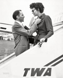September 12, 1952. "A bit of the husbandly touch is applied by Frankie Sinatra as he greets the missus, sultry Ava Gardner, on her arrival at Idlewild from Hollywood aboard Trans World Airlines' king-sized 'Ambassador' Constellation. Miss Gardner is visiting New York for the premier of her latest production, The Snows of Kilimanjaro. Aviation photo by Enell, Inc., N.Y. International Airport, Jamaica 20, N.Y." View full size.