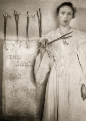 Circa 1900. "Elizabeth Felix with paperwhites (Clarence White's sister-in-law holding daffodils)." Gelatin silver print by Clarence H. White (1871-1925). View full size.