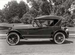 San Francisco circa 1920. "Haynes 'Fourdore' four-passenger roadster." The buggy with the baby bump in back. Glass negative by Christopher Helin. View full size.