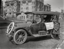The place: Van Ness Avenue in San Francisco, with St. Mary's Cathedral at far left. The year: 1921. The subject: Three Easterners who've motored west in a battered Cadillac touring car.  6½ x 8½ inch glass negative, originally from the Wyland Stanley collection. View full size.