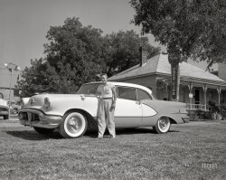 &nbsp; &nbsp; &nbsp; &nbsp; At Rucker Oldsmobile in Columbus, Georgia.
From around 1958 comes this News Archive photo of a "Safety Tested" used Oldsmobile -- a two-tone 1956 Ninety-Eight De Luxe Holiday Coupé, to be specific. Low miles, only driven to church, never smoked in, must see to appreciate! 4x5 inch acetate negative. View full size.