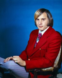 From around 50 years ago comes this uncaptioned News Archive negative that might have been used to illustrate a newspaper feature on trends in Seventies menswear. And what the men swear could curl your hair. But probably not this particular hair. View full size.