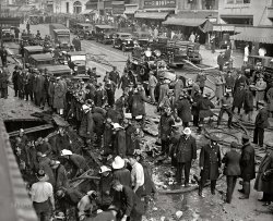 "McCrory fire, 11/21/29." Washington, D.C., firefighters at the McCrory five-and-dime on Seventh Street N.W., after a lunchtime boiler explosion in the store's basement -- a disaster whose final toll was six dead and dozens injured. 4x5 inch glass negative. View full size.