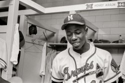 September 8, 1955. "Hank Aaron standing in front of his locker with misspelled name in the Milwaukee Braves locker room." Photo by Phillip Harrington for Look magazine. View full size.
Hank Aaron, Home Run King
Who Defied Racism, Dies at 86
&nbsp; &nbsp; &nbsp; &nbsp; Hank Aaron, who faced down racism as he eclipsed Babe Ruth as baseball’s home run king, hitting 755 homers and holding the most celebrated record in sports for more than 30 years, died today in Atlanta. He was 86. -- New York Times

