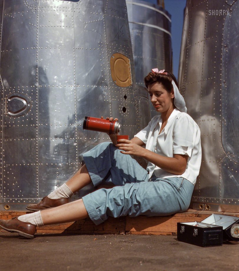 Empty Calories: 1942 "Nothing for me, thanks."
October 1942. "Girl worker at lunch also absorbing California sunshine, Douglas Aircraft Company, Long Beach." Kodachrome transparency by Alfred Palmer for the Office of War Information. View full size.