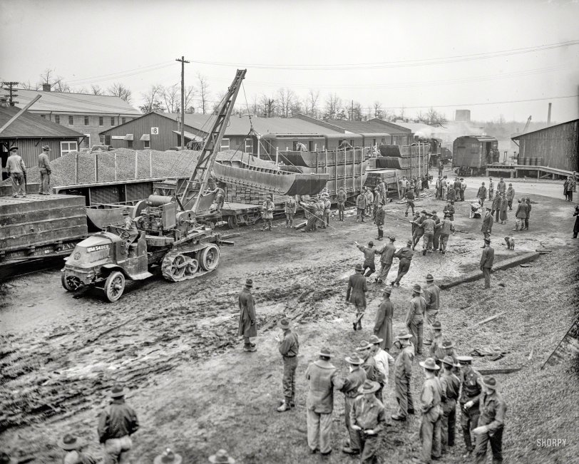 Flood Relief: 1937 Jan. 26, 1937. "Fort Belvoir troops proceed to flood area. Company B of the 5th Regiment of Engineers, stationed at this Virginia post a short distance from the Capitol, mobilized complete campaign equipment today and prepared to entrain immediately for the devastated flood area near Louisville, Kentucky. One of the boats to be used is shown being put aboard a railcar." View full size.