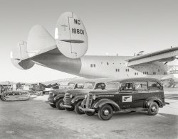 Aug. 28, 1939. "Golden Gate International Exposition, San Francisco. General Motors exhibit of GMC trucks with Pan American Airways Clipper Ship at Treasure Island. Bay Bridge in background."  The Boeing 314 flying boat Honolulu Clipper. 8x10 Agfa negative from the Wyland Stanley collection. View full size.